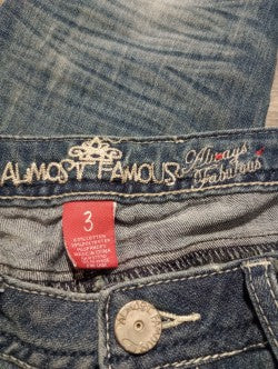 Almost Famous Women's Size 3 Destressed Skinny Jeans